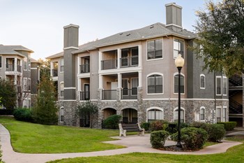 exterior of building with grass and pathway